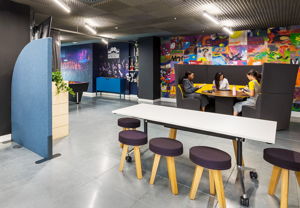 Commercial office fit out for Funding Circle breakout area with soft seating and tables